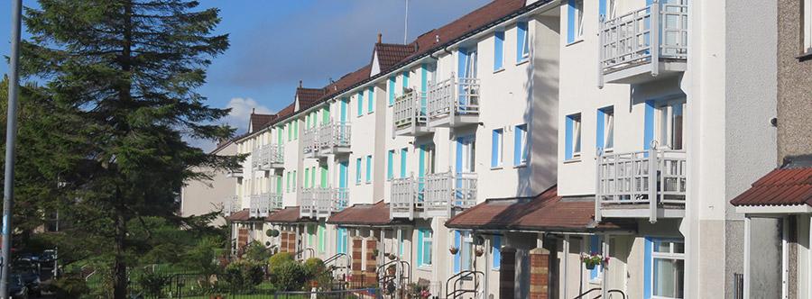 Block of Houses, daytime, trees on left of houses
